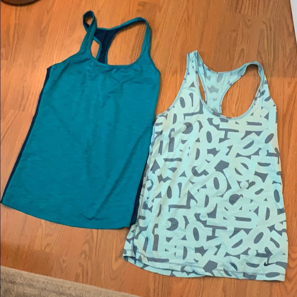 Two workout tanks size small new balance and Nike